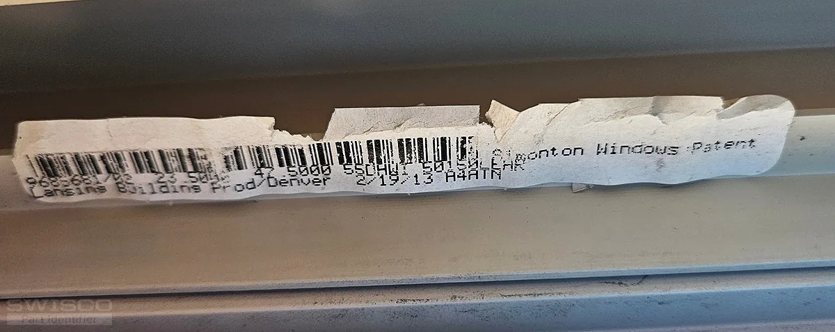 sticker on the top of the window frame